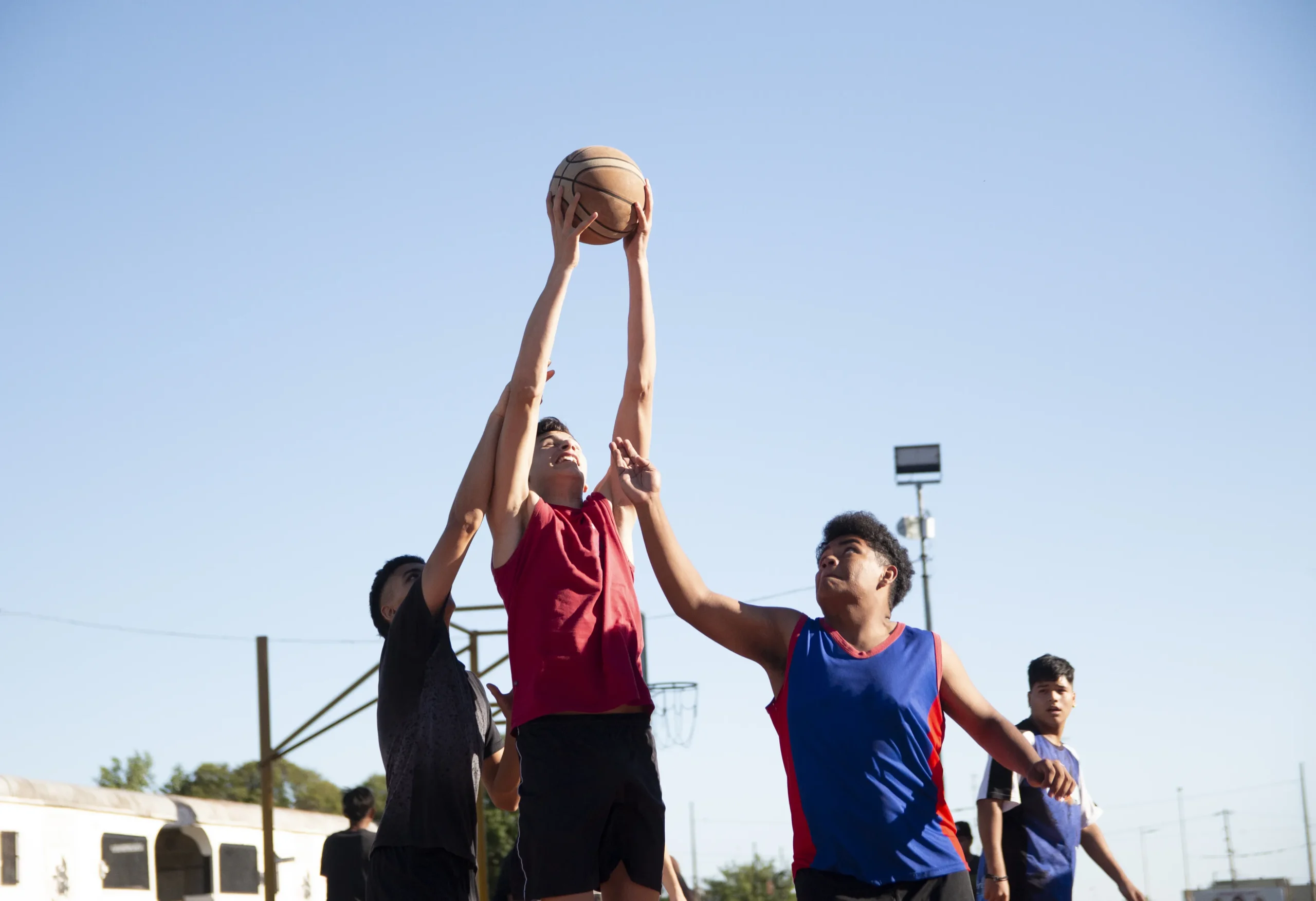 teenagers-playing-basketball